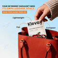 Klevay laundry sheets in a red handbag, lightweight and compact for travel