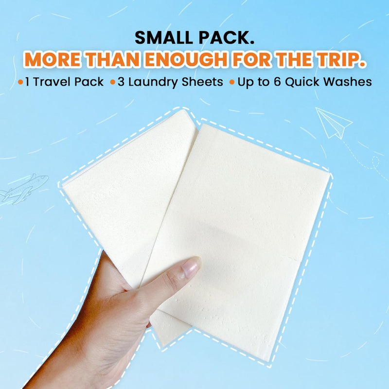 Hand holding two Klevay detergent sheets, a small pack for travel